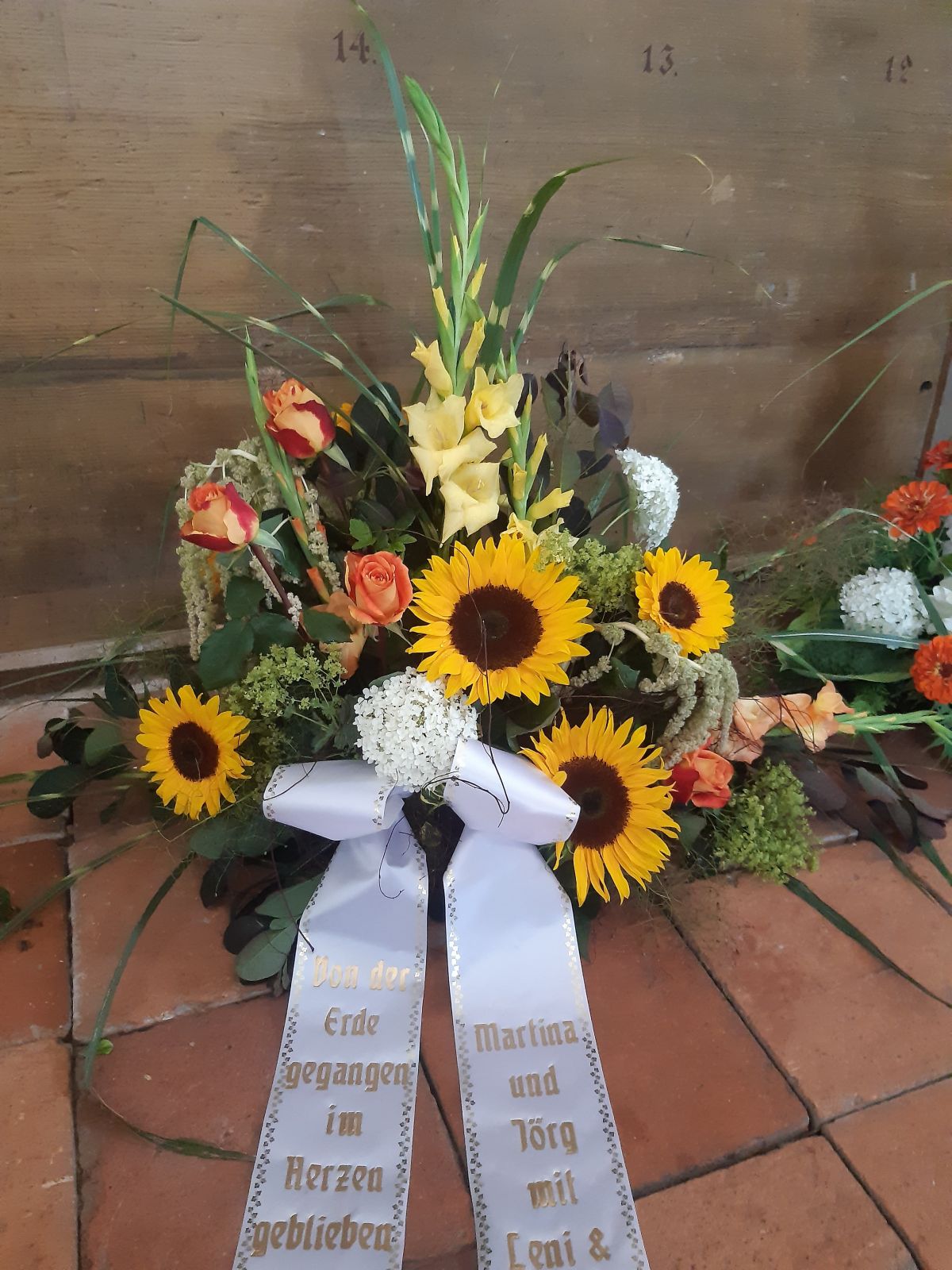 Trauergebinde Sonnenblumen